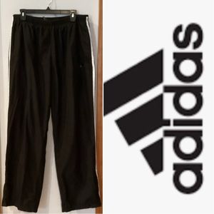 Adidas men’s XL black three stripe zip up sweatpants.